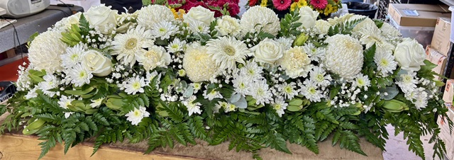 Full white casket spray
